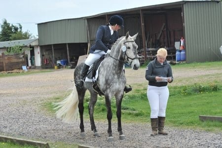 Debs helping a friend with training at the yard